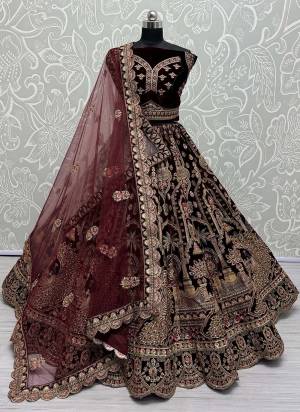 For A Fancy Designer Look,Grab These Lehenga Choli With 2 Dupatta in Fine Colored.These Lehenga And Choli Are Velvet And Dupatta Are Fabricated On Soft Net & Net Pair.Its Beautified With Designer Sequance,Thread,Dori,Jari Embroidery With Diamond Work.