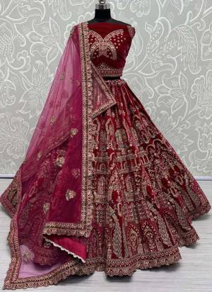 For A Fancy Designer Look,Grab These Lehenga Choli With 2 Dupatta in Fine Colored.These Lehenga And Choli Are Velvet And Dupatta Are Fabricated On Soft Net & Net Pair.Its Beautified With Designer Sequance,Thread,Dori,Jari Embroidery With Diamond Work.