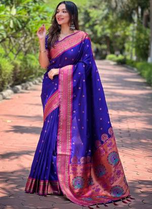 Looking These Party Wear Saree in Fine Colored.These Saree And Blouse is Fabricated On Paithani Silk.Its Beautified With Weaving Meenakari Designer.