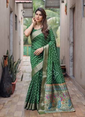 Attrective These Festive Wear Saree in Fine Colored.These Saree And Blouse is Fabricated On Dola Silk.Its Beautified With Wevon Jari Pallu Border Designer With Bandhej Printed.