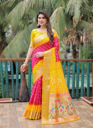 Garb These Party Wear Saree in Fine Colored.These Saree And Blouse is Fabricated On Dola Silk.Its Beautified With Wevon Paithani Pallu Border Designer With Handmade Bandhej Printed.