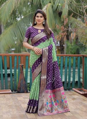 Garb These Party Wear Saree in Fine Colored.These Saree And Blouse is Fabricated On Dola Silk.Its Beautified With Wevon Paithani Pallu Border Designer With Handmade Bandhej Printed.