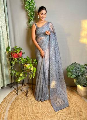 Garb These Party Wear Saree in Fine Colored.These Saree Are Crystal Silk And Blouse is Crystal Silk Fabricated.Its Beautified With Designer Sequance Embroidery Work.