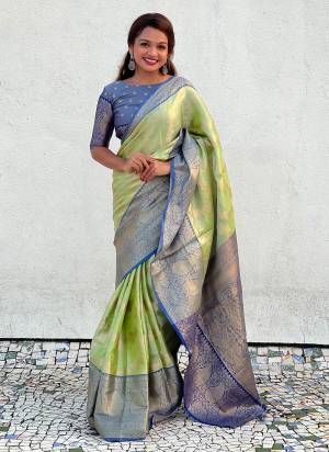 Attrective Look These Traditional Saree in Fine Colored.These Saree And Blouse is Fabricated On Tissue Silk.Its Beautified With Weaving Jari Designer.