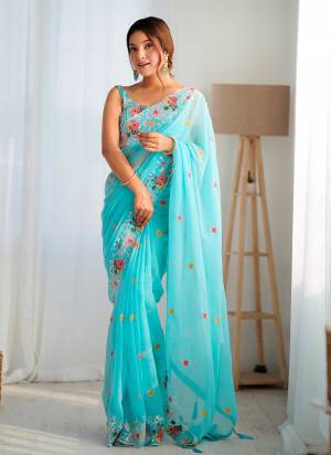 Looking These Party Wear Saree in Fine Colored.These Saree Are Georgette And Blouse is Georgette Fabricated.Its Beautified With Designer Multy Thread,Sequance Embroidery Work.