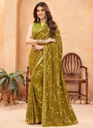 Looking These Fastival Wear Saree in Fine Colored.These Saree Are Faux Georgette And Blouse is Fabricated On Mulburry Silk.Its Beautified With Blooming Color With Heavy Designer Sequance Embroidery Work.