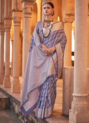 Looking These Fastival Wear Saree in Fine Colored.These Saree And Blouse is Fabricated On Viscose Silk.Its Beautified With Weaving Designer With H P Printed And Gold Foil.