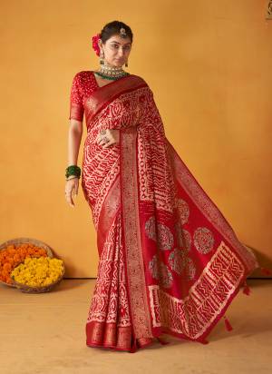 Garb These Party Wear Saree in Fine Colored.These Saree And Blouse is Fabricated On Tussar Silk Pair.Its Beautified With Wevon Designer With Batik Printed.