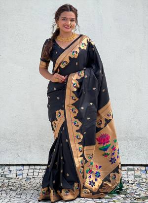 Attrective These Party Wear Saree in Fine Colored.These Saree And Blouse is Fabricated On Paithani Silk.Its Beautified With Weaving Jacquard Paithani Meenakari Designer.