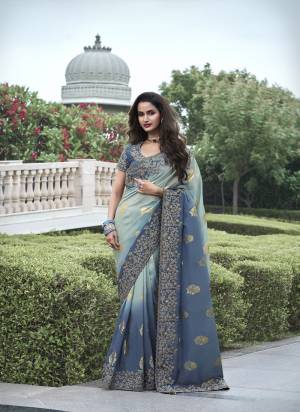 Looking These Fastival Wear Saree in Fine Colored.These Saree Are Tissue Silk And Blouse is Fabricated On Silk.Its Beautified With Designer Mirror,Jari Embroidery With Pearl Stone Work.