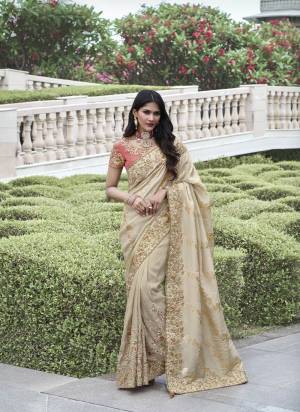 Looking These Fastival Wear Saree in Fine Colored.These Saree Are Tissue Silk And Blouse is Fabricated On Silk.Its Beautified With Designer Mirror,Jari Embroidery With Pearl Stone Work.