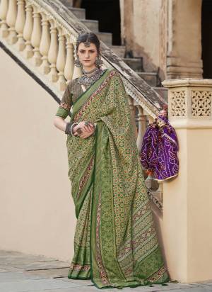 Garb These Fastival Wear Saree in Fine Colored.These Saree And Blouse is Fabricated On Sigma Silk.Its Beautified With Designer Ajrakh Printed With Aqua Finished.