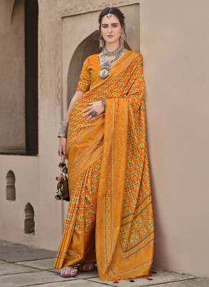 Garb These Fastival Wear Saree in Fine Colored.These Saree And Blouse is Fabricated On Sigma Silk.Its Beautified With Designer Ajrakh Printed With Aqua Finished.