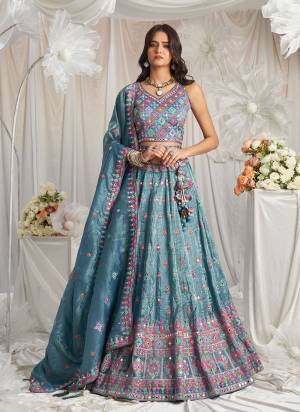 Attrective Looking This Partywear Fine Color Fancy Heavy Designer Choli And Lahenga Fabriced On Organza And Dupatta Organza In Fabricated Beautified With Attrective Designer Heavy Embroidery Work. Buy Now.