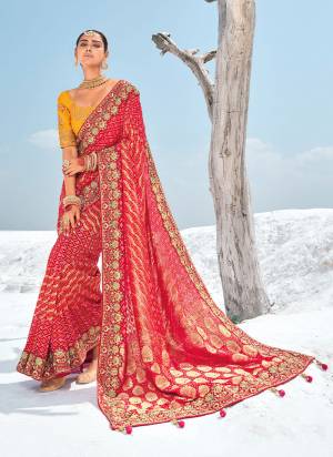 Looking These Traditional Party Wear Saree With 2 Blouse in Fine Colored.These Saree Are Georgette And Coming With 2 Blouse Fabricated On Art Silk.Its Beautified Wevon Designer With Bandhani Patola Printed With Embroidery Work Along With  1 Blouse With Embroidery Work And 1  Plain Rich Blouse.