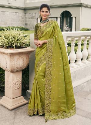 Attrective This Partywear Saree Paired With Blouse.This Saree Are Viscose Tissue And Blouse Are Viscose Tissue Based Fabric With Weaving Jari Designer With Embroidery Work. Buy This Pretty Saree Now.