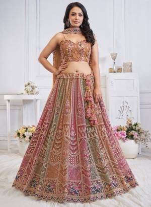 For A Fancy Designer Look,Grab These Lehenga Choli With Dupatta in Fine Colored.These Lehenga And Choli Are Soft Net And Dupatta Are Fabricated On Soft Net Pair.Its Beautified With Heavy Designer Embroidery,Stone Work.