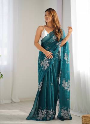 Looking These Party Wear Saree in Fine Colored.These Saree Are Jimmy choo And Blouse is Satin Silk Fabricated.Its Beautified With Designer Sequance Embroidery Work.