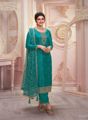 Garb These Designer Suit in Fine Colored Pair With Bottom And Dupatta.These Top Are Georgette And Dupatta Are Fabricated On Chiffon Pair With Santoon Bottom.Its Beautified With Santoon Inner.Its Beautified With Heavy Designer Embroidery Work.