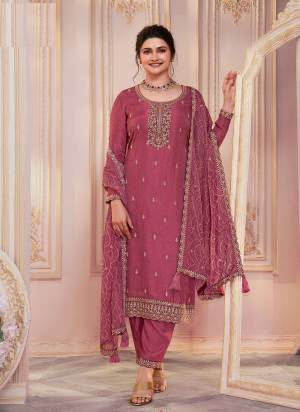 Garb These Designer Suit in Fine Colored Pair With Bottom And Dupatta.These Top Are Georgette And Dupatta Are Fabricated On Chiffon Pair With Santoon Bottom.Its Beautified With Santoon Inner.Its Beautified With Heavy Designer Embroidery Work.