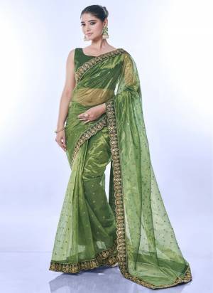 Looking These Festive Wear Saree in Fine Colored.These Saree is Fabricated On Golden Net Pair With Mono Banglori Blouse.Its Beautified Designer Sequance Embroidery Work.