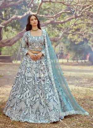 Attrective Looking This Partywear Fine Color Fancy Heavy Designer Choli And Lahenga Fabriced On Satin And Dupatta Net In Fabricated Beautified With Attrective Designer Heavy Embroidery Work. Buy Now.