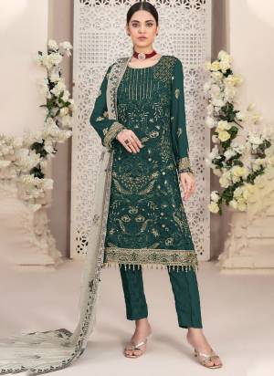 Garb These Designer Suit in Fine Colored Pair With Bottom And Dupatta.These Top Are Georgette And Dupatta Are Fabricated On Georgette Pair With Santoon Bottom.Its Beautified With Santoon Inner.Its Beautified With Heavy Designer Embroidery Work.