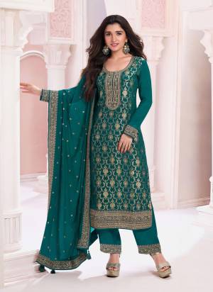 Looking These Designer Suit in Fine Colored Pair With Bottom And Dupatta.These Top Are Viscose Jacquard And Dupatta Are Fabricated On Chinon Pair With Santoon Bottom.Its Beautified With Santoon Inner.Its Beautified With Heavy Wevon Jacquard Designer, Embroidery Work.