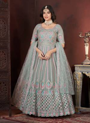 Attrective Looking These Beautiful Looking Readymade Gown With Dupatta.These Gown And Dupatta is Fabricated On Net.Its Beautified With Designer Embroidery With Zarkan Work.