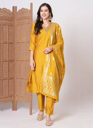 Garb These Suit in Fine Colored Pair With Bottom And Dupatta.These Top And Bottom Are Fabricated On PV Chanderi Pair With Jacquard Silk Dupatta.Its Beautified With Designer Embroidery Work.