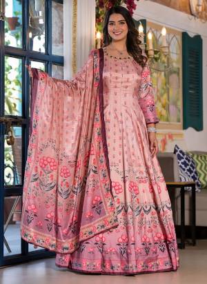 Garb These Designer Gown in Fine Colored Pair With Dupatta.These Gown Are Fabricated On Dola Silk Pair With Chinon Dupatta.Its Beautified With Designer Digital Printed With Hand Work.