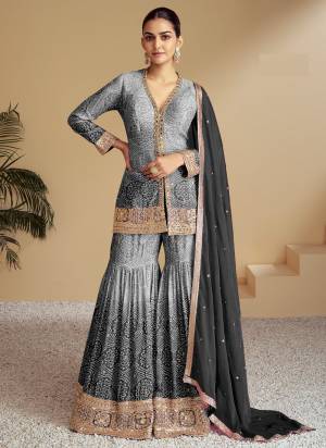 Attrective These Designer Salwar Suit in Fine Colored Pair With Bottom And Dupatta.These Top and Bottom Are chinon And Dupatta Are Fabricated On Chinon. Its Beautified With Embrodiary, sequence &  Zari Work.