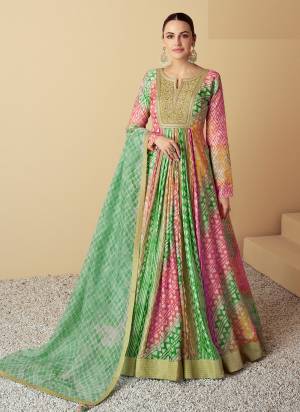 Garb These Party Wear Anarkali Dress in Fine Colored Pair With Dupatta.These Top Are Muslin And Dupatta Are Fabricated On Organza Pair.Its Beautified With Designer Printed With Embroidery Work