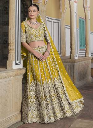 Grab These Wedding Party Wear Lahenga Choli in Fine Colored.These Blouse And Lahenga Are Fabricated On Butterfly Net Pair With Butterfly Net Dupatta.Its Beautified With Heavy Designer Sequance Embroidery With Diamond Work.