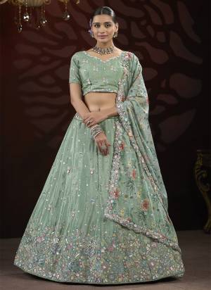 For A Fancy Designer Look,Grab These Lehenga Choli With Dupatta in Fine Colored.These Lehenga And Choli Are Chinon And Dupatta Are Fabricated On Georgette Pair.Its Beautified With Designer Sequance,Thread Embroidery Work With Flower Printed Dupatta.