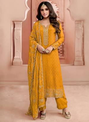 Attrective Looking These Party Wear Suit in Fine Colored Pair With Bottom And Dupatta.These Top Are Dola Jacquard And Dupatta Are Fabricated On Chinon Pair With Santoon Bottom.Its Beautified With Wevon Jacquard Designer With Heavy Embroidery Work.