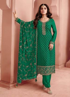 Attrective Looking These Party Wear Suit in Fine Colored Pair With Bottom And Dupatta.These Top Are Dola Jacquard And Dupatta Are Fabricated On Chinon Pair With Santoon Bottom.Its Beautified With Wevon Jacquard Designer With Heavy Embroidery Work.