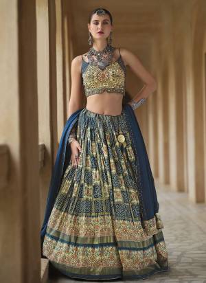 For A Designer Look,Grab These Lehenga Choli in Fine Colored.These Lehenga And Blouse Are Fabricated On Smooth Silk Pair With Georgette Dupatta.Its Beautified With Designer Foil Printed With Embroidery Work.