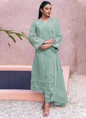 Looking These Designer Suit in Fine Colored Pair With Bottom And Dupatta.These Top Are Georgette And Dupatta Are Fabricated On Nazmin Pair With Santoon Bottom.Its Beautified With Santoon Inner.Its Beautified With Heavy Designer Embroidery Work.