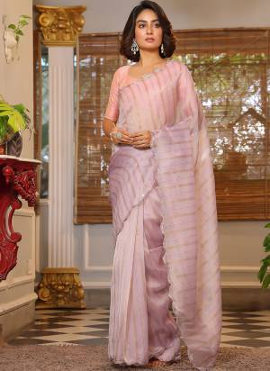 Attrective Looking These Party Wear Saree in Fine Colored.These Saree Are Organza And Blouse is Fabricated On Banglori Satin.Its Beautified With Wevon Golden Lining Designer Sequance Embroidery,Arco Cut Work.