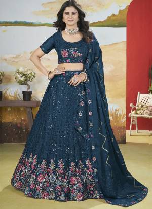 For A Fancy Designer Look,Grab These Lehenga Choli With Dupatta in Fine Colored.These Lehenga And Choli Are Chinon And Dupatta Are Fabricated On Georgette Pair.Its Beautified With Designer Sequance,Multy Thread Embroidery Work.