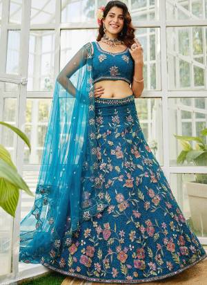 Attrective Looking This Partywear Fine Color Fancy Heavy Designer Choli And Lahenga Fabriced On Net And Dupatta Net In Fabricated Beautified With Attrective Designer Heavy Thread,Coding Embroidery Work. Buy Now.