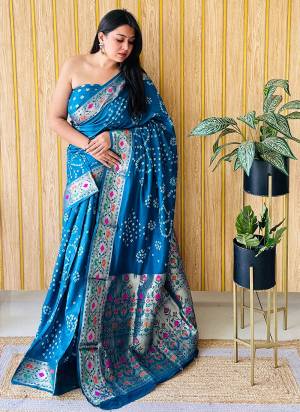 Garb These Party Wear Saree in Fine Colored.These Saree And Blouse is Fabricated On Silk.Its Beautified With Wevon Paithani Designer With Original Bandhej Disigner.