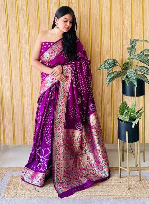 Garb These Party Wear Saree in Fine Colored.These Saree And Blouse is Fabricated On Silk.Its Beautified With Wevon Paithani Designer With Original Bandhej Disigner.