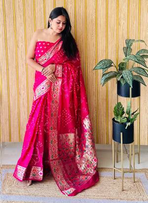 Garb These Party Wear Saree in Fine Colored.These Saree And Blouse is Fabricated On Silk.Its Beautified With Wevon Paithani Designer With Original Bandhej Disigner.