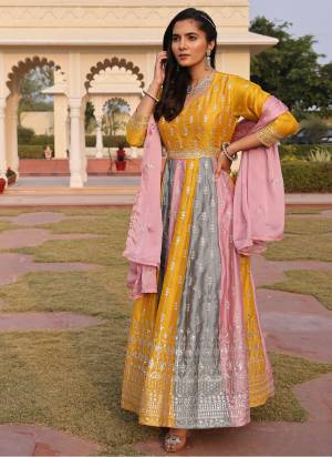 Attrective Looking These Anarkali Suit in Fine Colored Pair With Bottom And Dupatta.These Top Are Rangoli Silk And Dupatta Are Fabricated On Rangoli Silk Pair With Crepe Bottom.Its Beautified With Designer Embroidery Work.