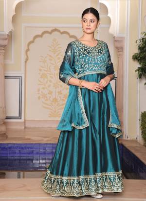 Attrective Looking These Anarkali Suit in Fine Colored Pair With Bottom And Dupatta.These Top Are Rangoli Silk And Dupatta Are Fabricated On Rangoli Silk Pair With Crepe Bottom.Its Beautified With Designer Embroidery Work.