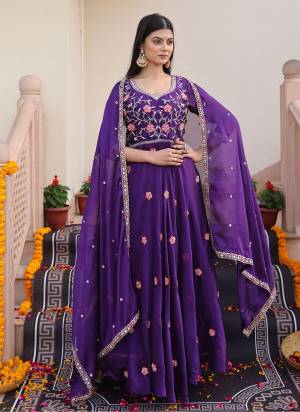 Attrective Looking These Anarkali Suit in Fine Colored Pair With Bottom And Dupatta.These Top Are Rangoli Silk And Dupatta Are Fabricated On Rangoli Silk Pair With Crepe Bottom.Its Beautified With Designer Embroidery Work.