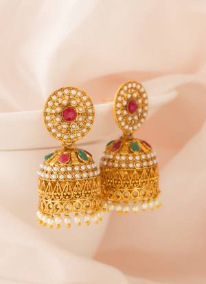 Grab These Beautifil Golden Colored Earring Jhumka.These Earring is Come Bross & Copper Material And Beautified With Artificial Stone Work.