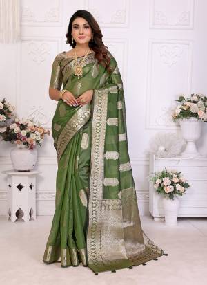 Looking These Party Wear Saree in Fine Colored.These Saree And Blouse is Fabricated On Organza.Its Beautified With Wevon Jari Designer.